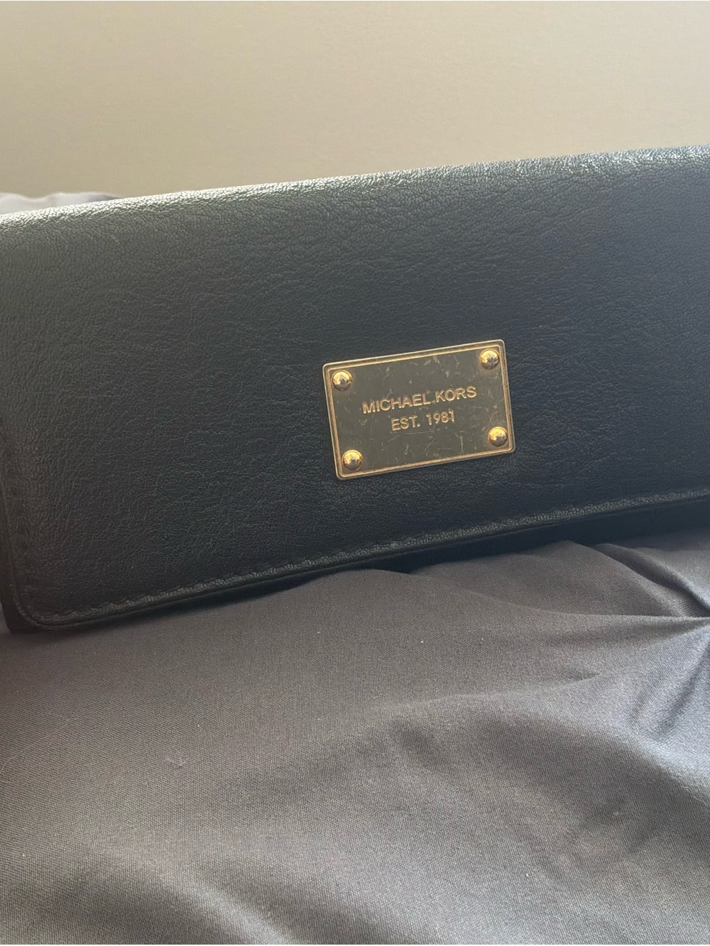 Michael Kors Black Leather Clutch with Gold Plaque Detail